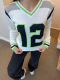 White Seattle Tribute Sweater with "12" and green V-Neck (UNISEX SIZING)